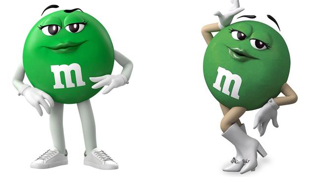 The green M&amp;M looking less fly in sneakers, left, than gogo boots.