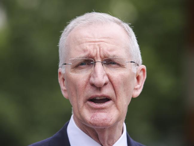 AMP's Acting CEO Mike Wilkins reads a statement to the media after leaving the Banking Royal Commission into Misconduct in the Banking, Superannuation and Financial Services Industry in Melbourne, Wednesday, November 28, 2018. (AAP Image/Wayne Taylor) NO ARCHIVING