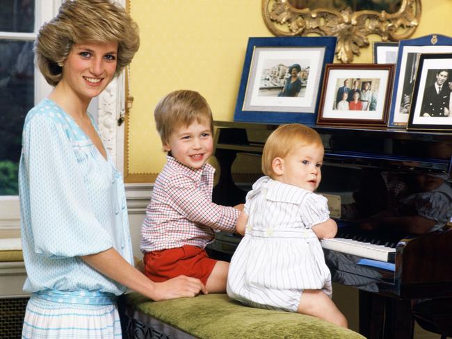 Diana, Princess of Wales with her sons, Prince William and Prince Harry, at the piano in Kensington Palace. Picture: Tim Graham/Getty Images