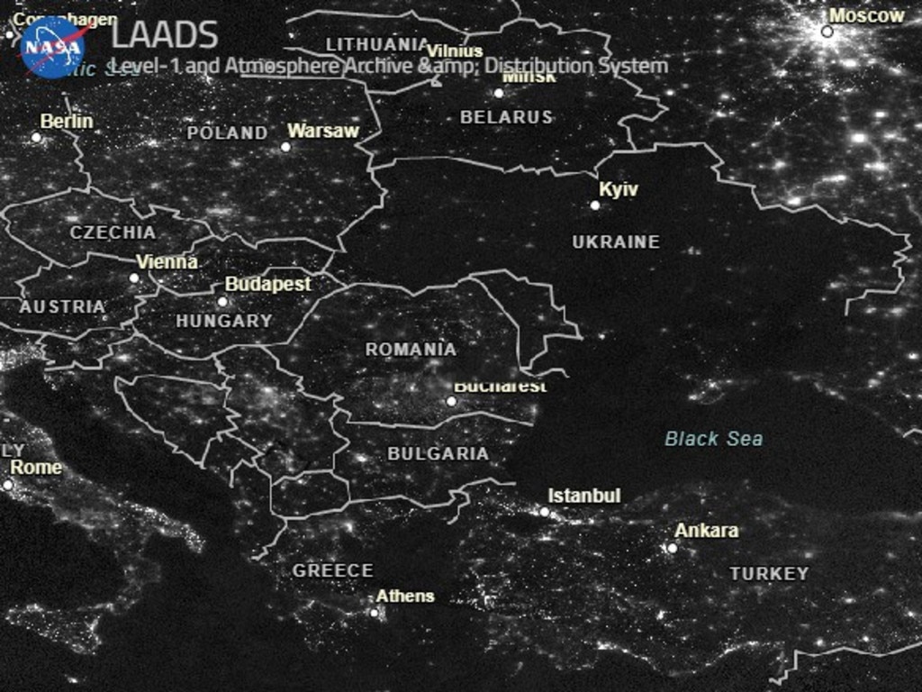 The second image, taken a month later, shows almost all of Ukraine in darkness.