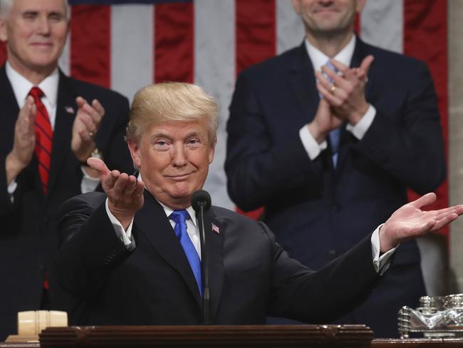 President Donald Trump gestures as he delivers his first State of the Union address. Picture: Win McNamee/Pool/AP