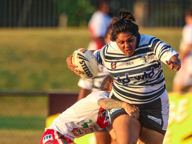 Sistaz Prop Khani White (ball) takes on Nightcliff. Picture Glenn Campbell