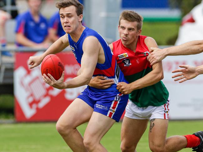 Pines livewire Khyal Jacobson tackles a Mornington opponent in a practice game last month. Picture: Alan Dillon