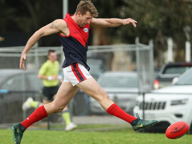 David Kovacevic gets a kick away for St Albans in the WRFL. Picture: Local Legends Photography