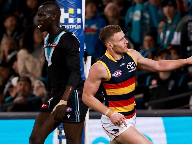 ADELAIDE, AUSTRALIA - AUGUST 20: Rory Laird of the Crows celebrates a goal during the 2022 AFL Round 23 match between the Port Adelaide Power and the Adelaide Crows at Adelaide Oval on August 20, 2022 in Adelaide, Australia. (Photo by James Elsby/AFL Photos via Getty Images)