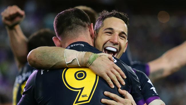 Melbourne Storm players Billy Slater and Cameron Smith celebrate at full time after defeating the North Queensland Cowboys in the 2017 NRL Grand Final at ANZ Stadium, Sydney. Picture. Brett Costello