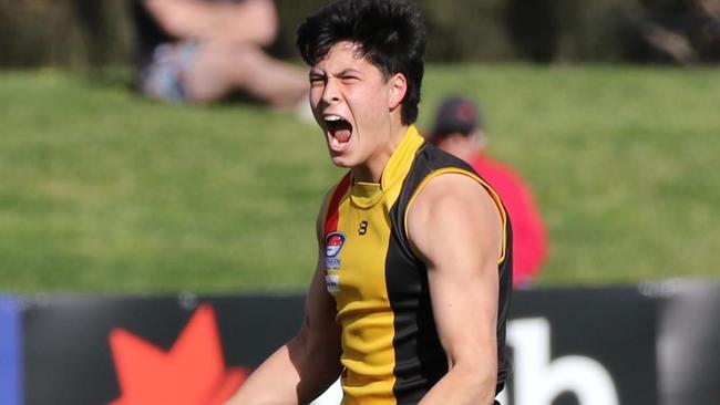 Josh Lai celebrates one of his two semi final goals this September. Picture: Andrew Keech.