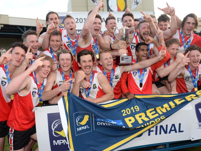 Red Hill celebrates its 2019 flag at Frankston Park. Picture: Chris Eastman