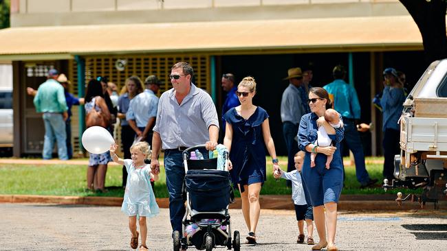 Family and friends depart Casuarina Street primary school after Dolly Everett's memorial service in Katherine, Northern Territory.