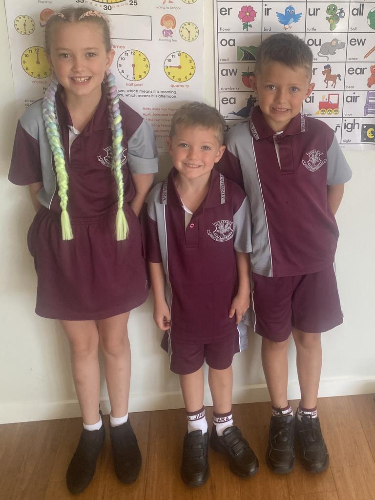 Elijah Curry’s first day at prep with his big sister and brother to guide him the way Picture: Jason Curry