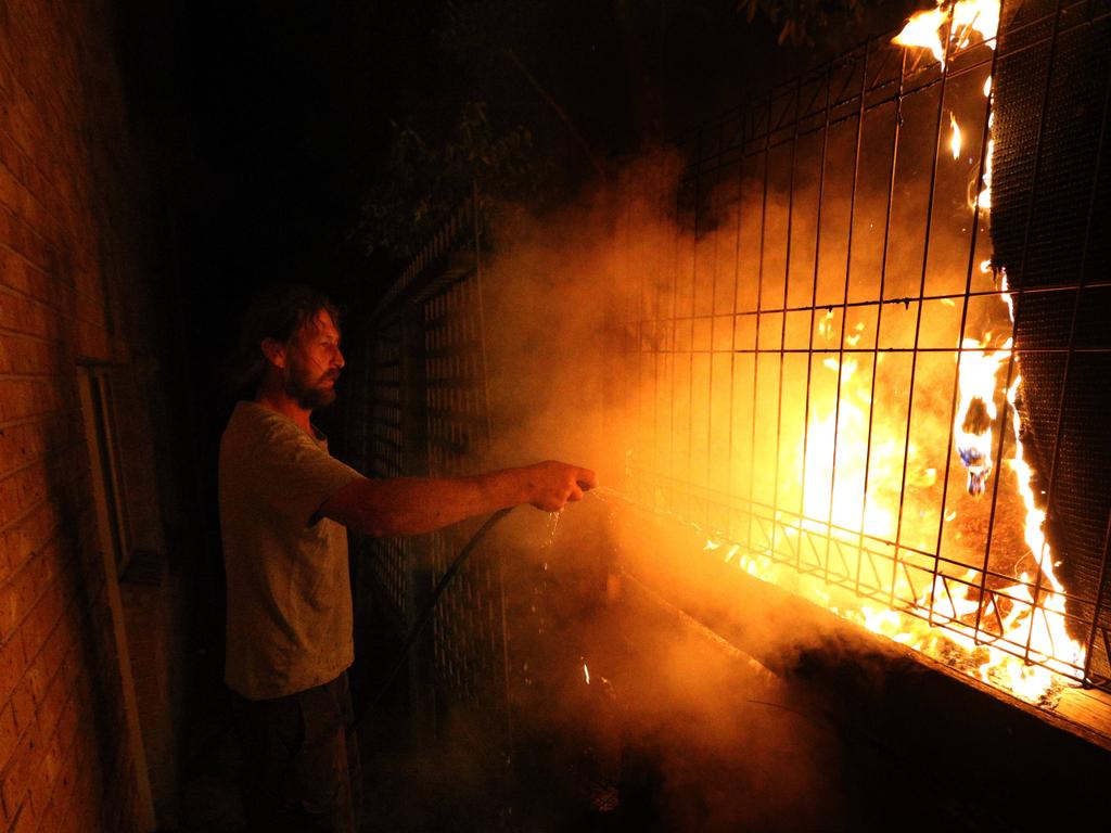 Tathra resident Julian Brown, 33 years, fought a spot fire at the back of his house in the early hours of Monday 19th March. The seaside town of Tathra on the NSW south coast, lost 70 homes in a massive blaze. Picture Gary Ramage