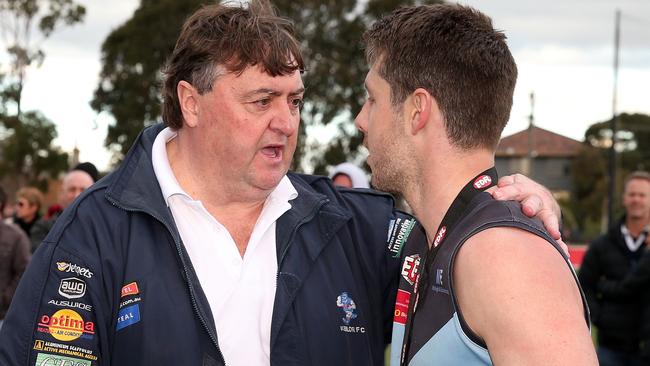 Mick McGuane congratulates Aberfeldie’s Luke Blackwell, who was best afield. Picture: Mark Dadswell