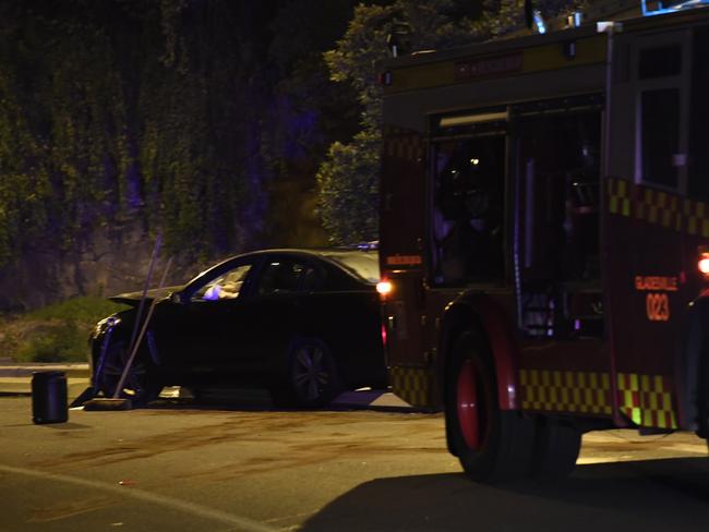 The driver of the Holden fled the scene after injuring two officers in the crash. Picture: Gordon McComiskie