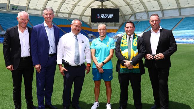 James Johnson, CEO, Football Australia, Tameka Yallop, Midfielder, CommBank Matildas and Queensland Government representative pose during an AFC Women's Asian Cup 2026 Announcement at Cbus Super Stadium on November 13, 2024 in Gold Coast, Australia. (Photo by Chris Hyde/Getty Images)