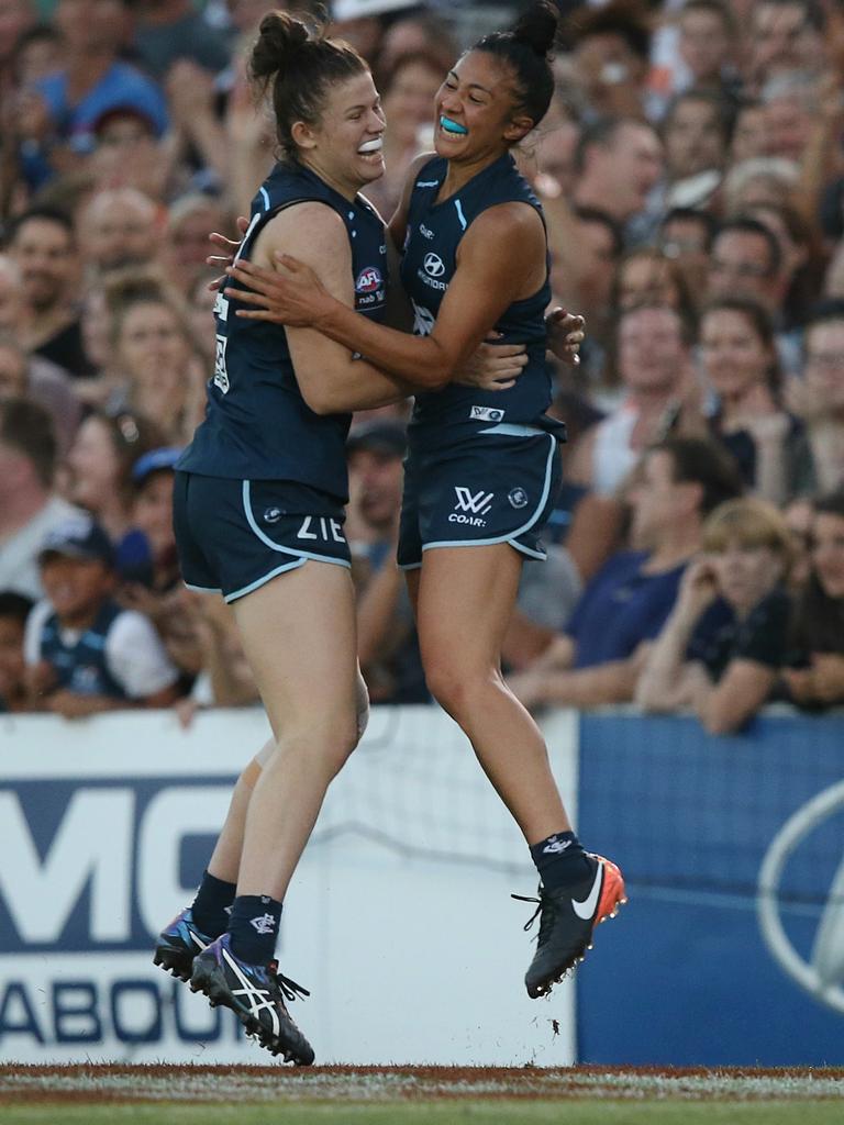 Darcy Vescio celebrates a goal during the firs AFLW game.