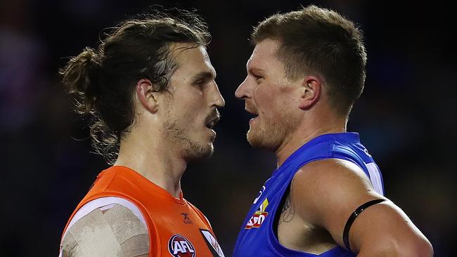 Jack Redpath comes face to face with Phil Davis after the incident last Friday night. Picture: Michael Klein