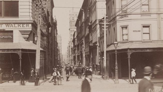 Flinders Lane, seen from Swanston St in 1895, was the home of Melbourne’s rag trade. Picture: State Library Victoria