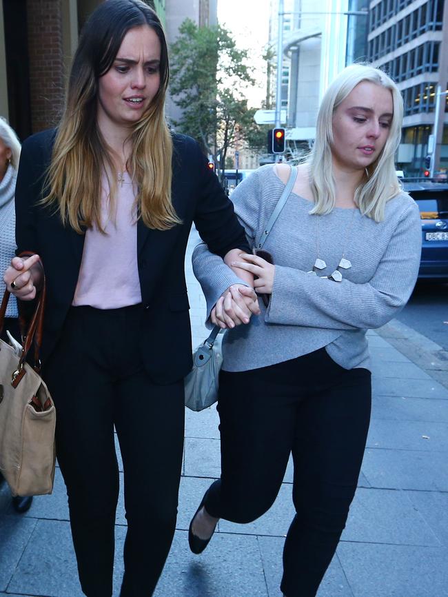 Lucy and sister Jessica McNamarra leave King St court. Their father earlier told the court his co-accused threatened to kill his “lovely girls”. Britta Campion / The Australian.