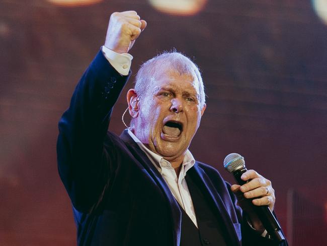 John Farnham and Olivia Newton-John perform during Fire Fight Australia at ANZ Stadium on February 16, 2020 in Sydney, Australia.