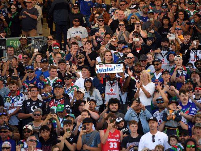 Warriors fans show their support during the NRL Pre-season challenge match between New Zealand Warriors and Wests Tigers in Christchurch. (Photo by Kai Schwoerer/Getty Images)