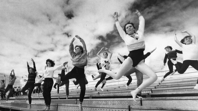 South Australia callisthenics performers practise dancing on the stands at Victoria Park in Adelaide in December 1985.