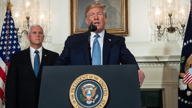 Donald Trump speaks alongside Vice-President Mike Pence yesterday at the White House about the mass shootings in Texas and Ohio. Picture: AFP. AFpfrom