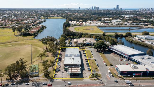 117 Ashmore Rd, with a BP servo fronting the road , Benowa Tavern at the end of Showcase Crt and Amart on the eastern of the court