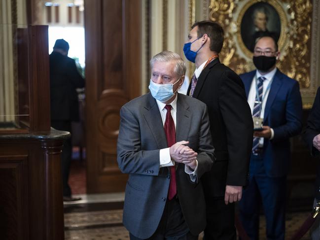 Senator Lindsey Graham, R-S.C., walks out of a meeting room for lawyers of former President Donald Trump. Picture: AFP