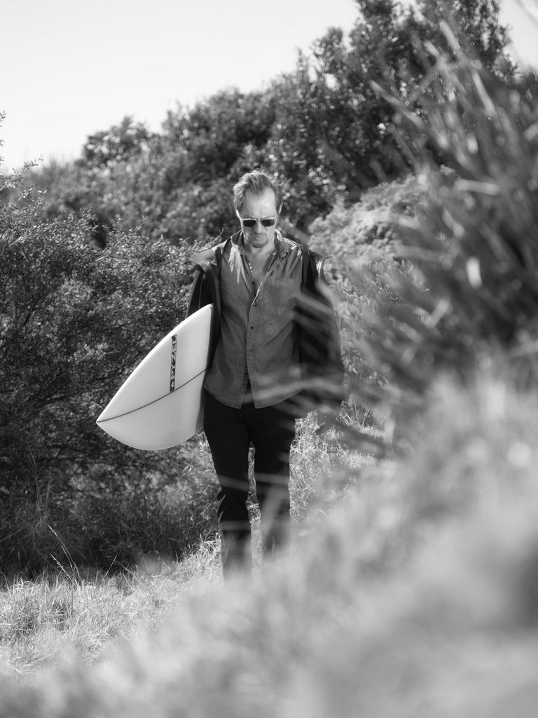 Richard Tognetti, one of Australia’s most talented violinists, is celebrating 30 years at the helm of the Australian Chamber Orchestra. Returning to East Corrimal, a surf beach not far from where he grew up in Wollongong, south of Sydney, he reflects on the enduring pull of his home town, and the relationship between the waves and his music. Picture: Nic Walker