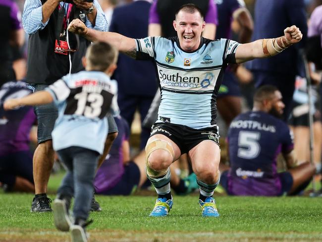 Sharks captain Paul Gallen celebrates with his son Cody Gallen after victory in the 2016 NRL Grand Final against the Melbourne Storm. (Photo by Matt King/Getty Images)