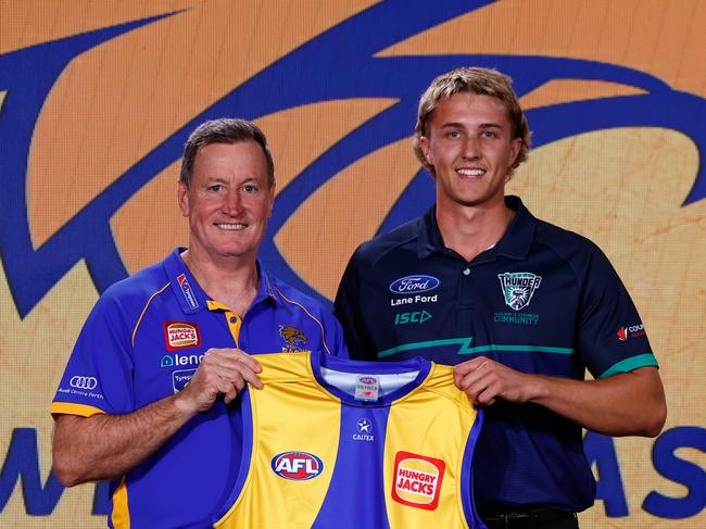 Bo Allan receives his West Coast jumper from John Worsfold.