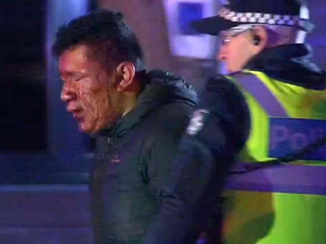 Screengrab showing a man injured during a brawl on Collingwood Street, Collingwood, Melbourne. 7News