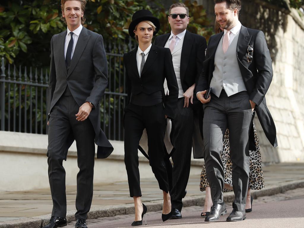 Give Cara the crown (that’s what happens at royal weddings, right?). Photo: Alastair Grant — WPA Pool/Getty Images