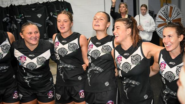 Southport Sharks players celebrate a win. Picture: Highflyer Images