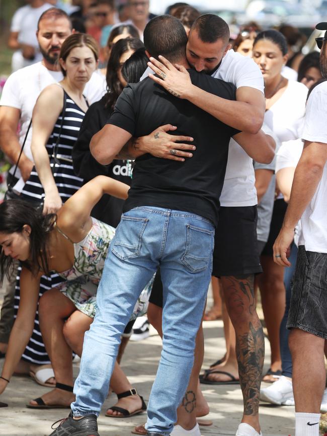 Danny Abdallah is comforted at Oatlands. Picture: John Grainger