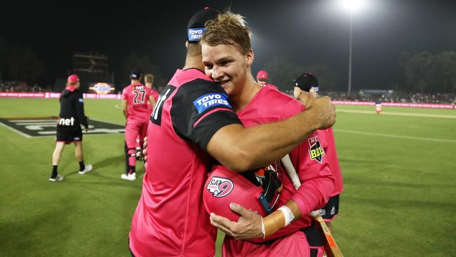 Josh Philippe celebrates after guiding the Sixers to victory on Sunday. Picture: AAP Image/Jason O'Brien