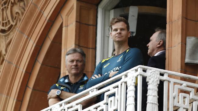 Steve Waugh and Steve Smith take refuge from the rain at Lord’s overnight. Picture: Getty Images