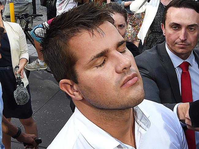 Gable Tostee reacts as he leaves the Supreme Court in Brisbane after being found not guilty of murder or manslaughter.