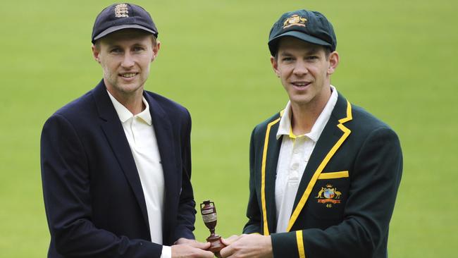 England captain Joe Root, left, and Australia's captain Tim Paine pose with the Ashes urn. Picture: AP