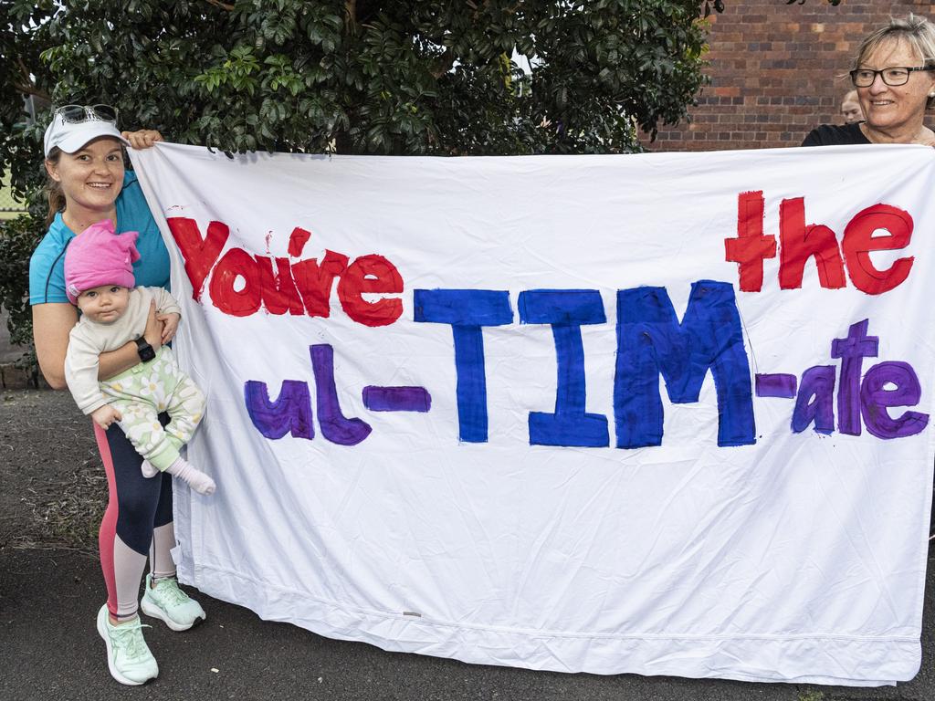 Showing support for half marathon runner Tim George is Margrit George holding baby Jemima George and Michelle Wixted at the Toowoomba Marathon event, Sunday, May 5, 2024. Picture: Kevin Farmer