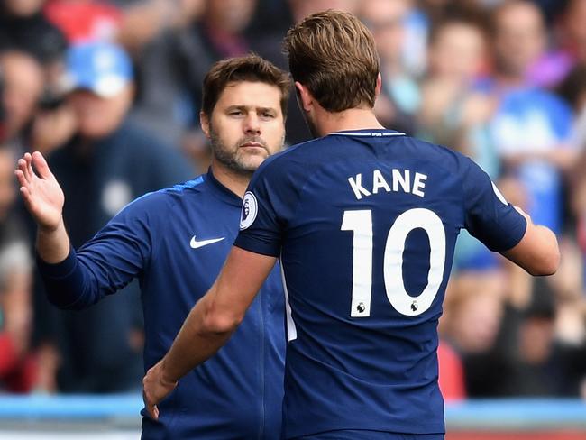 Harry Kane of Tottenham Hotspur with Mauricio Pochettino.