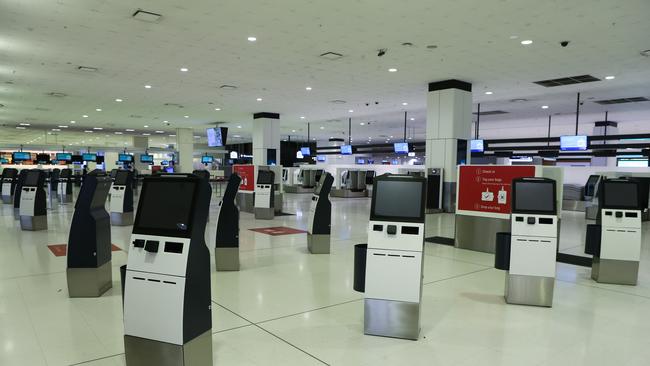 Sydney International Airport is a ghost town due to COVID-19 ahead of Christmas. Picture: NCA NewsWire / Gaye Gerard