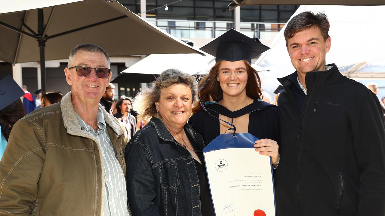 Deakin University graduate Andriana Oliver with parents Mark and Loula and boyfriend John Fisher. Picture: Alison Wynd