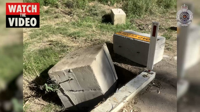 Truck driver allegedly causes trail of destruction at Queensland border