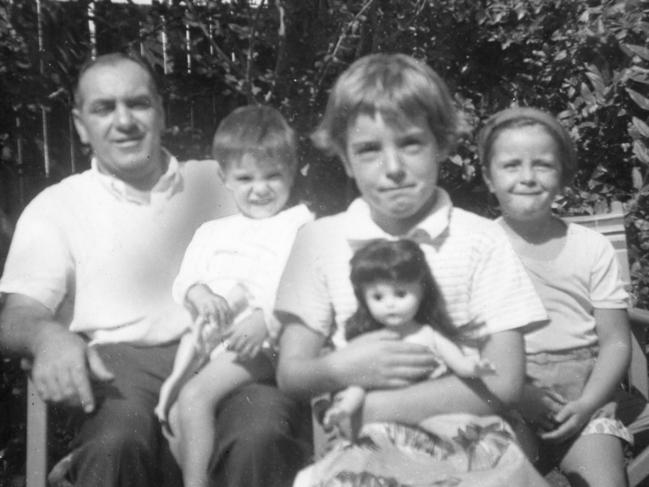 (L-r) Mr Jim Beaumont with his children Grant, Jane and Arnna.  Filed Sep 1966.Supplied family album style pic of The Beaumont children, Jane, 9, Arnna, 7, and Grant, 4, who disappeared from Glenelg, SA, on 26 Jan 1966.  (Copyright unknown)