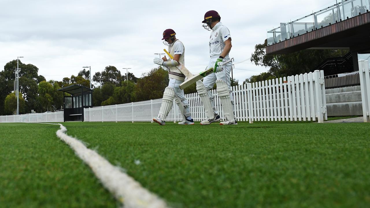 Bryce Street and Marnus Labuschagne, with an arm guard, go back to bat for Queensland in Adelaide. Picture: Mark Brake/Getty Images