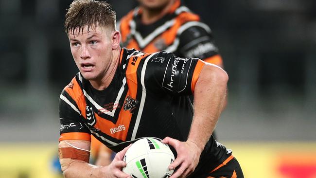 Harry Grant wasted little time making his mark for Wests Tigers. Picture: Cameron Spencer/Getty Images