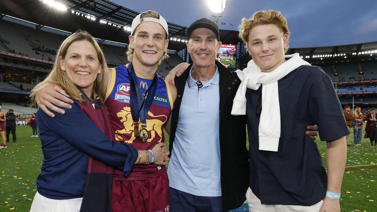 Marcus and Rebekah Ashcroft pictured with sons, Will and Levi, at last year’s AFL Grand Final clash between Sydney and Brisbane. Picture: Michael Klein