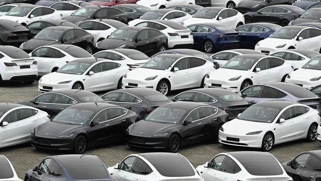 Tesla electric cars stationed in a storage area in Belgium. Picture: John Thys/AFP