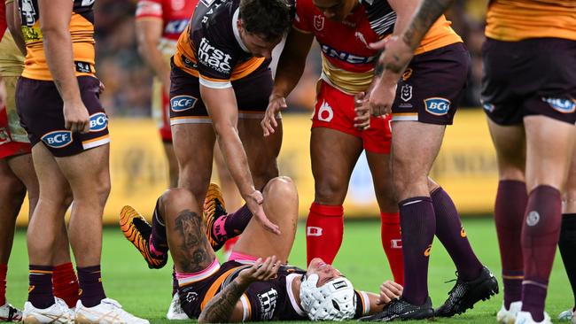 Brisbane Broncos star Reece Walsh lays prone on the turf. Picture: NRL Photos